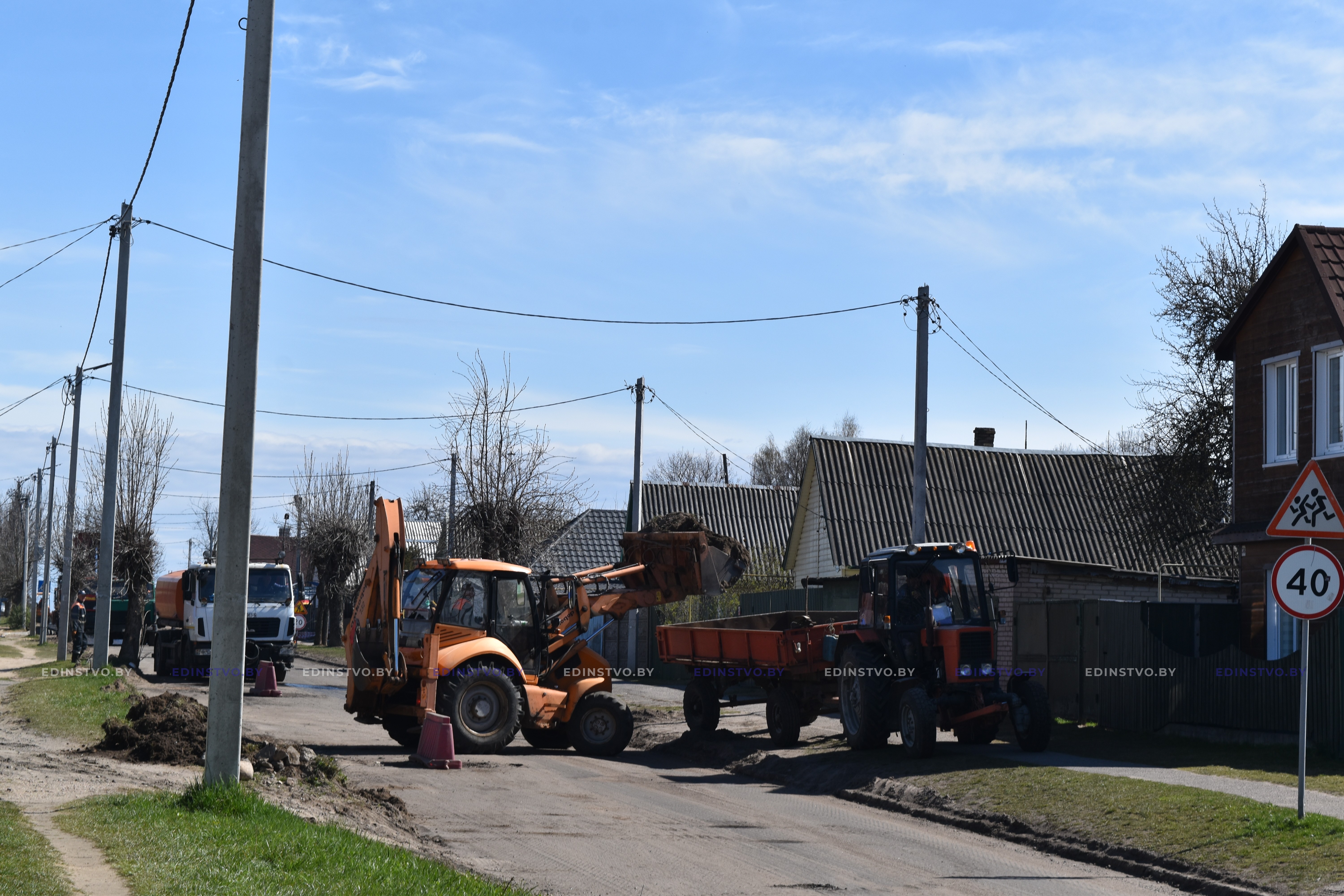 Фоторепортаж: укладка выравнивающего слоя асфальта на ул. Адамовича в Борисове 3 Фоторепортаж: укладка выравнивающего слоя асфальта на ул. Адамовича в Борисове
