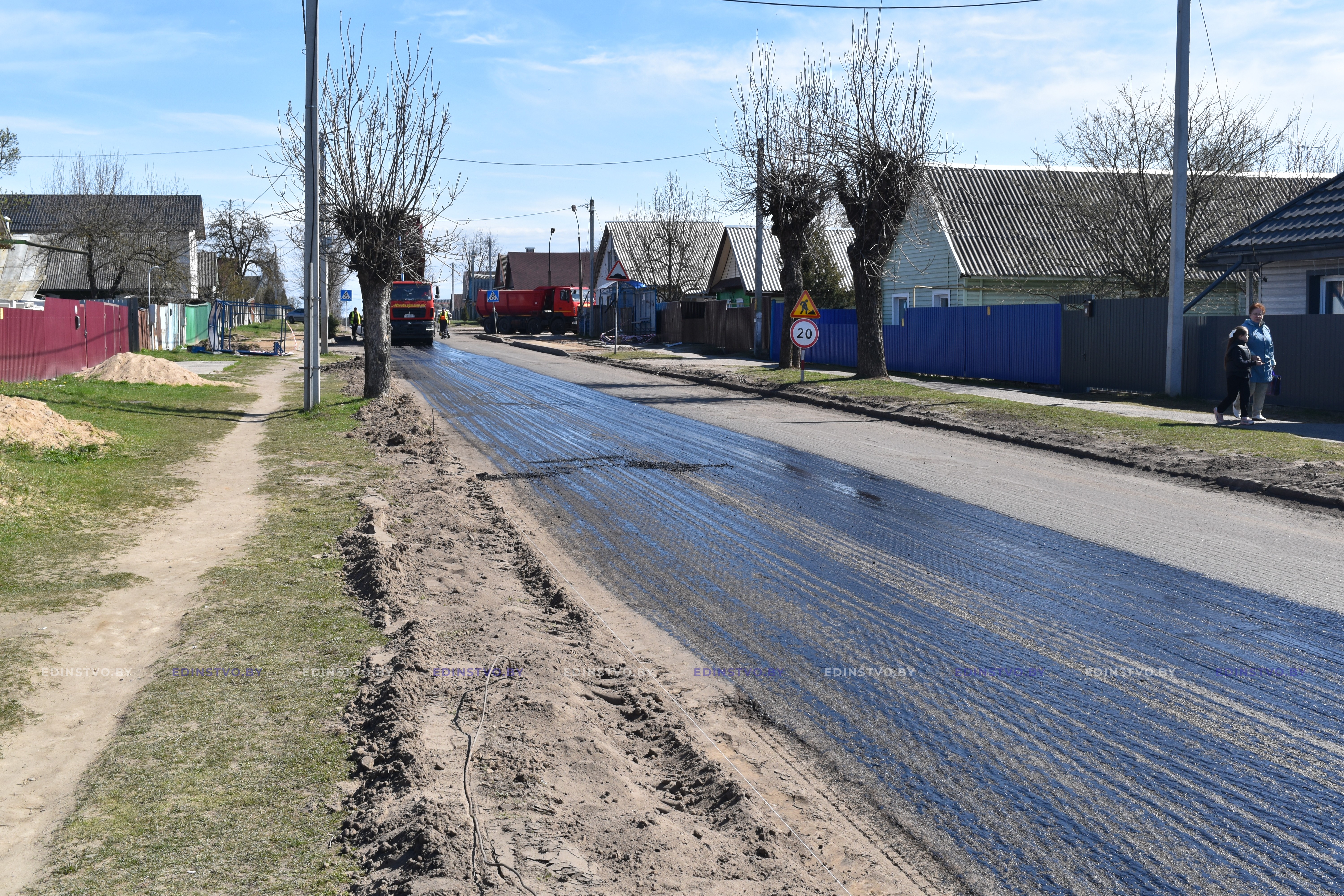 Фоторепортаж: укладка выравнивающего слоя асфальта на ул. Адамовича в Борисове 5 Фоторепортаж: укладка выравнивающего слоя асфальта на ул. Адамовича в Борисове